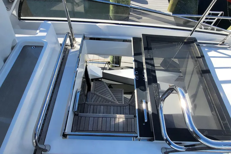 Slide: The Image of Staircase on 2023 Azimut S7 yacht with sleek design and modern railing. - 13