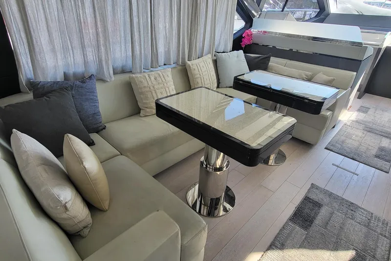 Slide: The Image of Luxurious interior of 2023 Azimut S7 yacht with elegant seating and modern tables. - 20