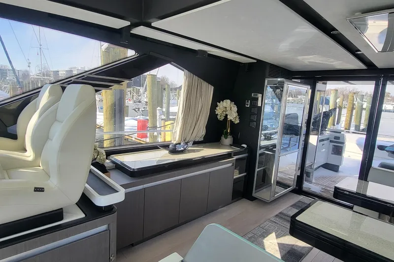 Slide: The Image of Luxurious interior of 2023 Azimut S7 yacht with modern seating and elegant decor. - 29