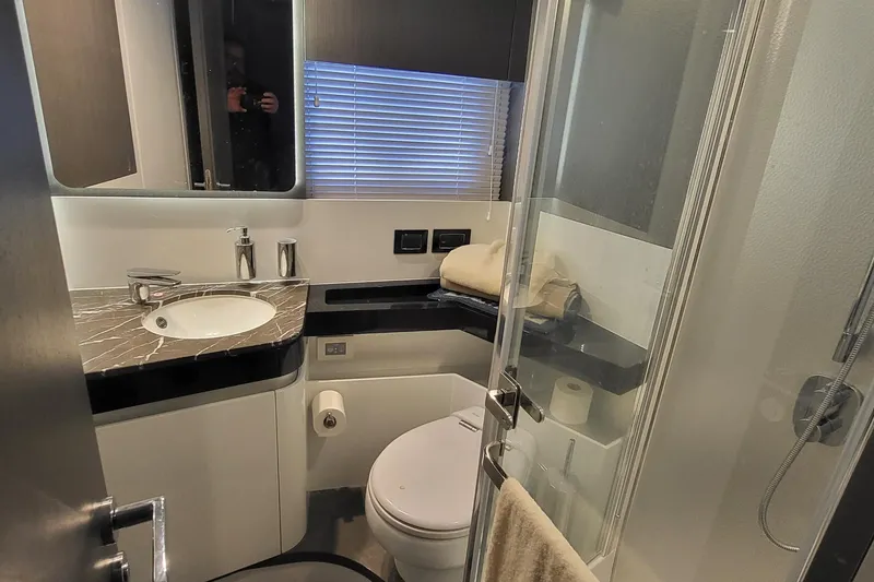 Slide: The Image of Luxurious 2023 Azimut S7 yacht bathroom with modern fixtures and elegant design. - 35
