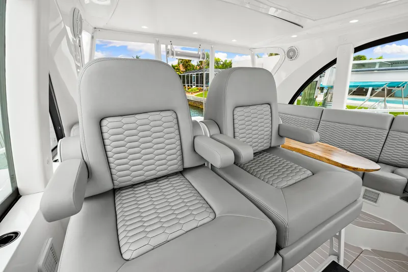 Slide: The Image of Luxurious interior seating of 2019 Intrepid 410 Evolution yacht with modern design. - 52