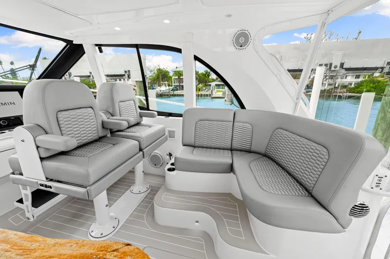 Slide: The Image of Luxurious interior of 2019 Intrepid 410 Evolution yacht with plush seating and modern design. - 53