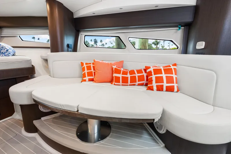 Slide: The Image of Luxurious interior of 2019 Intrepid 410 Evolution yacht with stylish seating and vibrant cushions. - 59