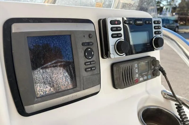 Slide: The Image of 2011 Sea Hunt BX 22 BR boat console with Garmin and Clarion electronics. - 28