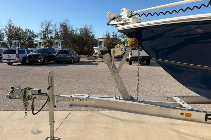Slide: The Image of 2011 Sea Hunt BX 22 BR boat on trailer in parking lot. - 35
