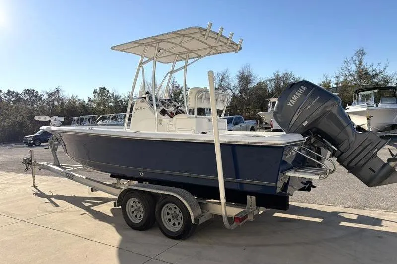 Slide: The Image of 2011 Sea Hunt BX 22 BR boat on trailer with Yamaha outboard motor. - 5