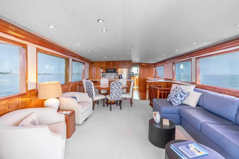 Slide: The Image of Luxurious interior of 2000 Hatteras 75 Sport Deck Motor Yacht with elegant seating and ocean views. - 42