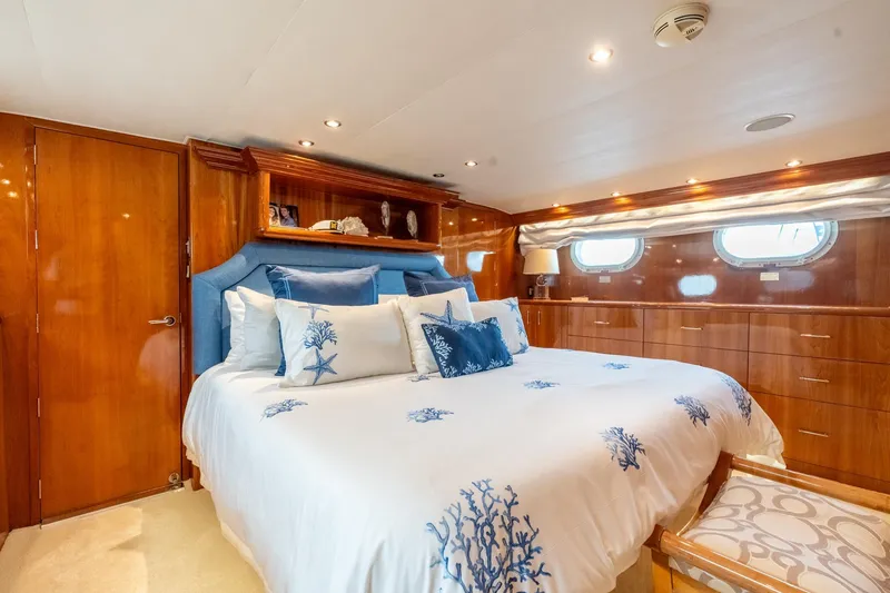 Slide: The Image of Luxurious bedroom interior of 2000 Hatteras 75 Sport Deck Motor Yacht. - 50