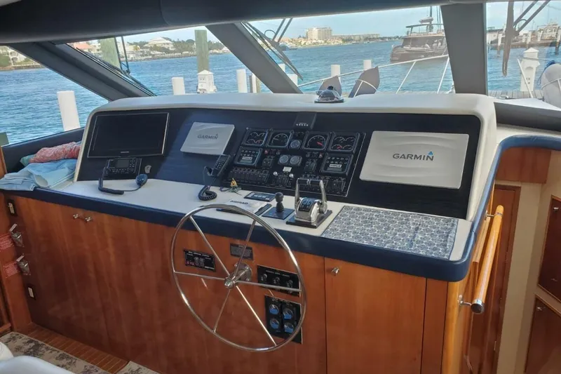Slide: The Image of Helm of 2000 Hatteras 75 Sport Deck Motor Yacht with Garmin navigation system. - 8