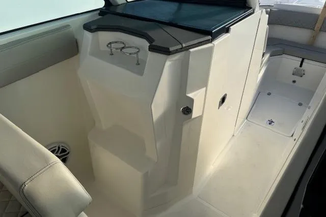 Slide: The Image of 2023 Pursuit DC 295 Dual Console interior with sleek design and modern amenities. - 47