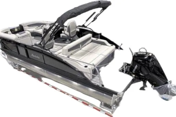 Slide: The Image of 2023 Barletta C22UC pontoon boat with sleek design and powerful outboard motor. - 10