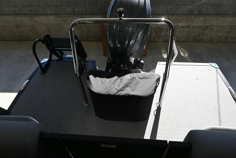 Slide: The Image of Rear view of 2026 Evotti 521QL boat with motor and deck details. - 10