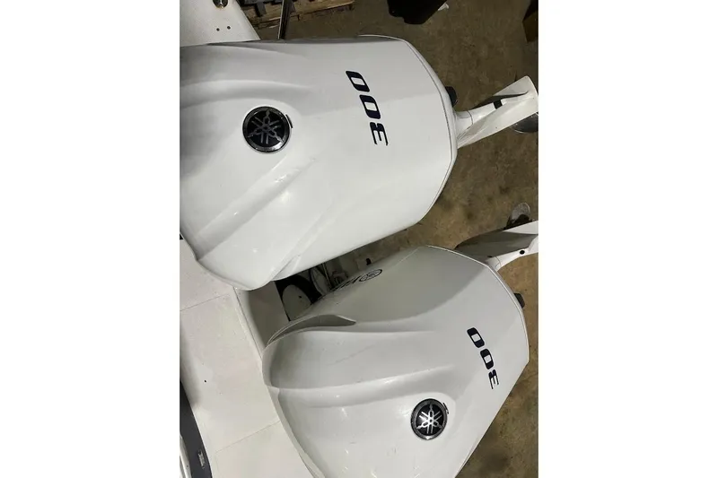 Slide: The Image of Twin Yamaha 300 outboard engines on a 2017 Cutwater C-302 Coupe boat. - 14