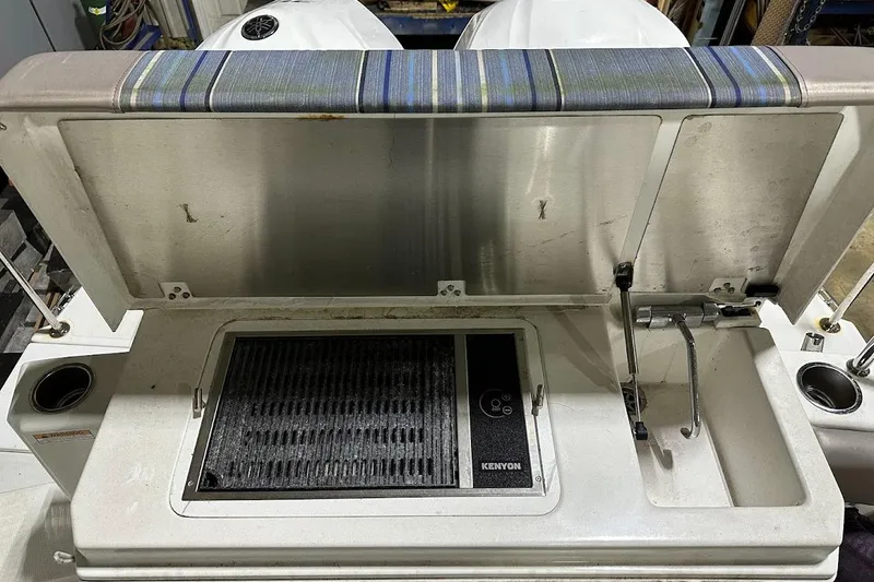 Slide: The Image of 2017 Cutwater C-302 Coupe boat grill and sink setup with Kenyon grill. - 15