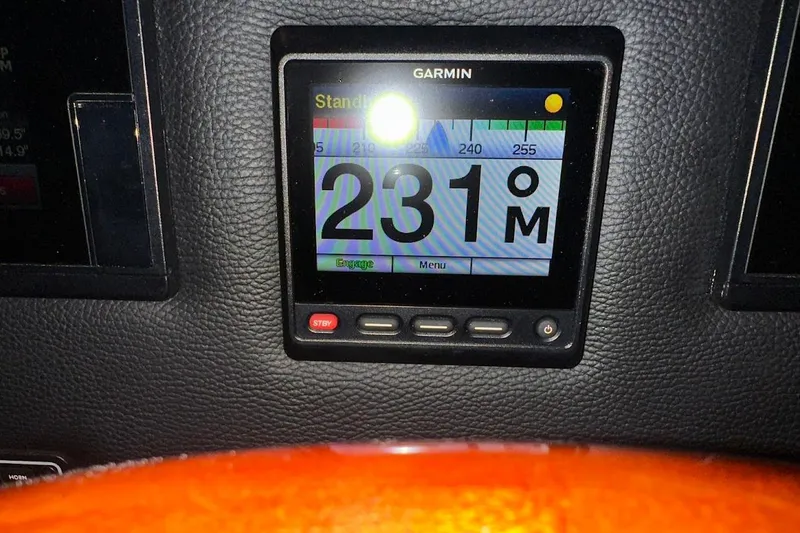 Slide: The Image of Garmin display on 2017 Cutwater C-302 Coupe dashboard showing 231 degrees. - 34