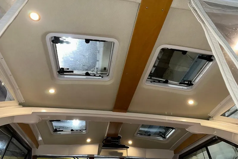 Slide: The Image of Interior ceiling of 2017 Cutwater C-302 Coupe with skylights and recessed lighting. - 43