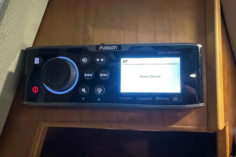 Slide: The Image of Fusion MS-UD750 stereo system in 2017 Cutwater C-302 Coupe, displaying Bluetooth device selection. - 47