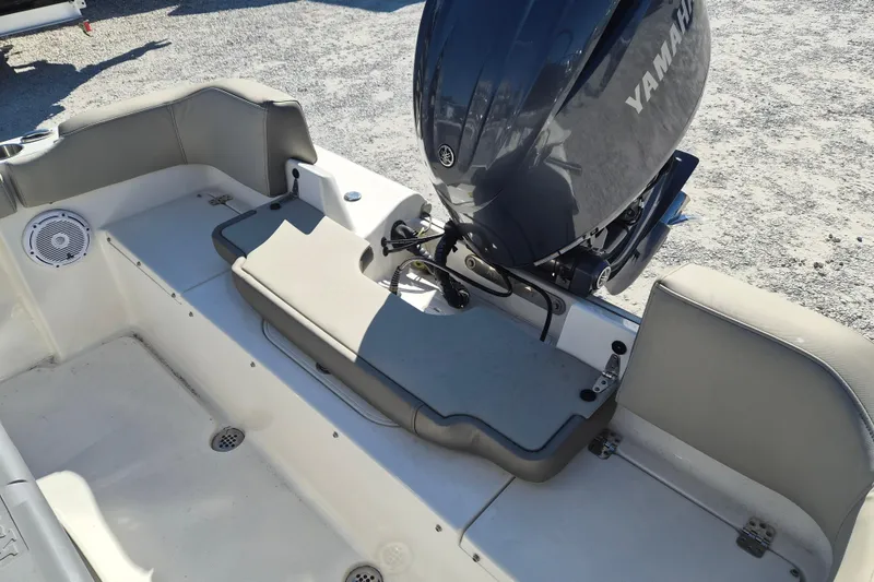 Slide: The Image of 2022 Key West 203 FS boat with Yamaha outboard motor, rear seating area. - 3
