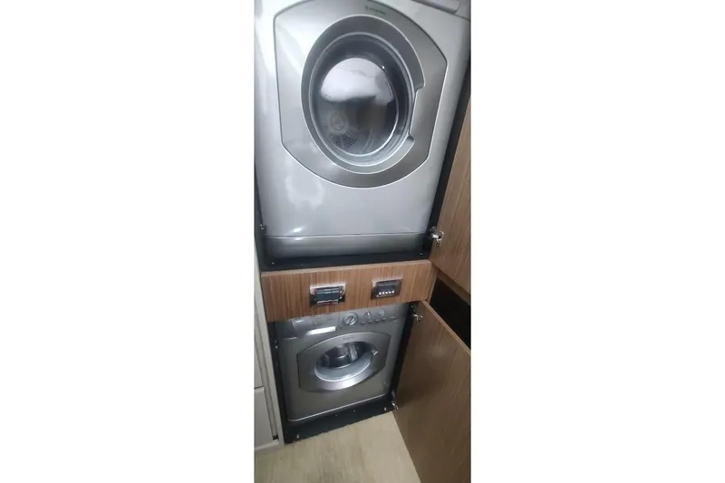 Slide: The Image of Interior hallway of 2016 Sea Ray L590 yacht with illuminated stairs. - 18