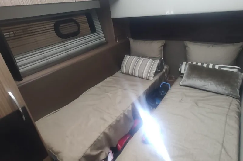 Slide: The Image of Luxurious bathroom in 2016 Sea Ray L590 yacht with modern fixtures and elegant design. - 19