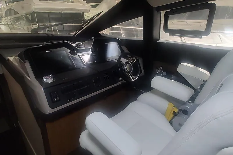 Slide: The Image of Luxurious interior of 2016 Sea Ray L590 yacht with cozy seating and modern design. - 21