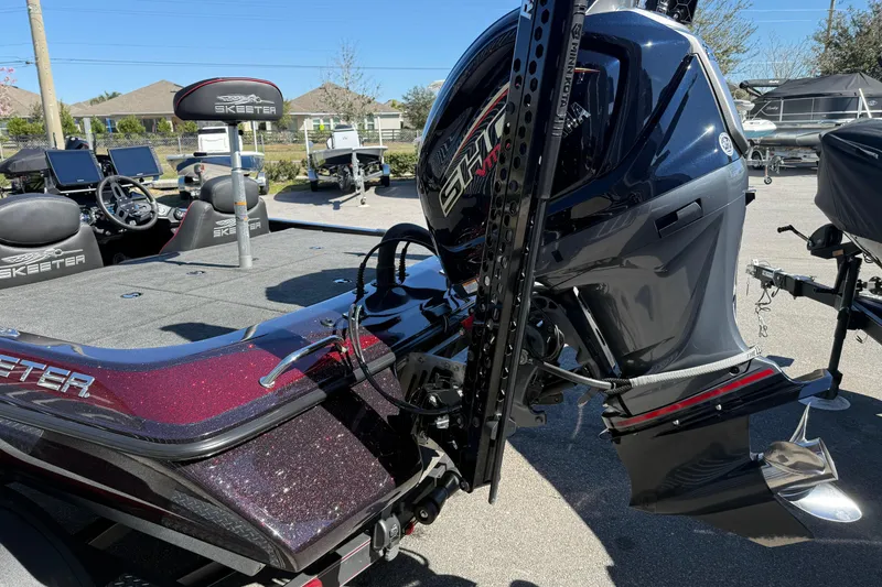 Slide: The Image of 2023 Skeeter ZX200 boat with Yamaha engine, featuring sleek design and advanced controls. - 12