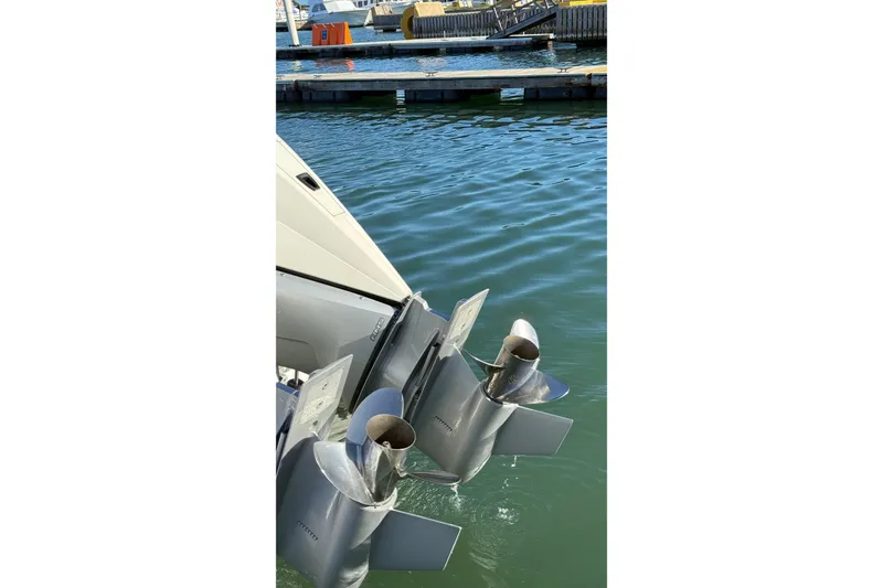 Slide: The Image of 2007 Wellcraft 290 Coastal boat propellers in marina water. - 5