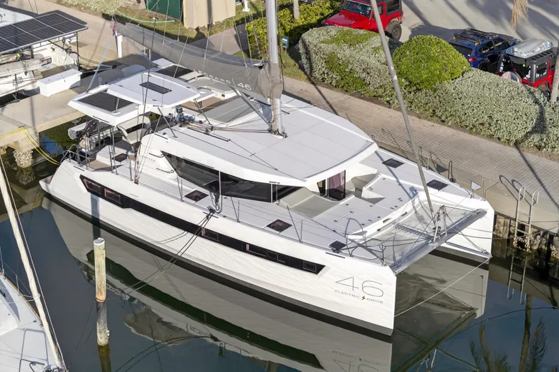 The Image of Luxury Leopard 46 catamaran docked, 2025 model, featuring sleek design and solar panels. - 0