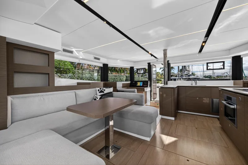 Slide: The Image of Luxurious interior of 2025 Leopard 46 yacht with modern furnishings and panoramic windows. - 16