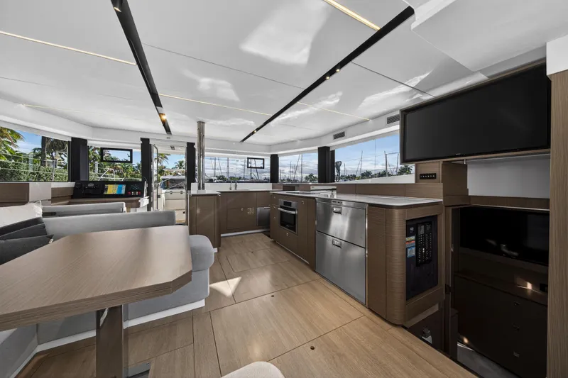 Slide: The Image of Luxurious interior of 2025 Leopard 46 yacht with modern kitchen and seating area. - 17