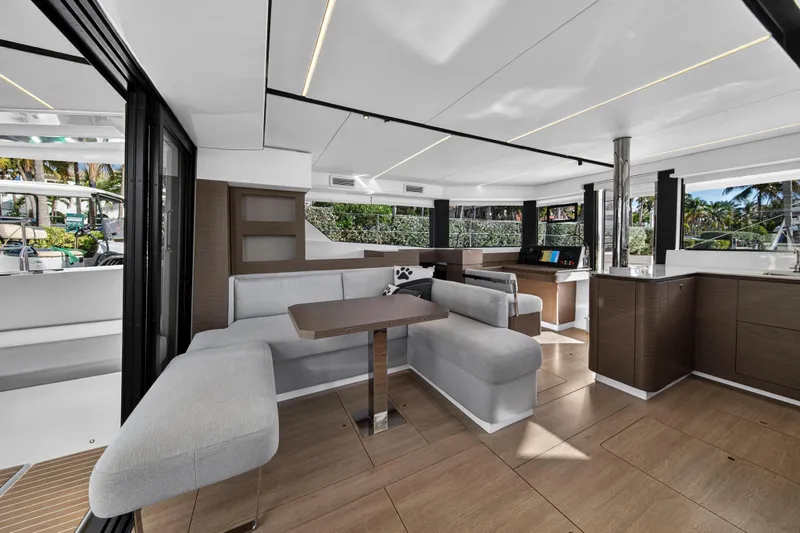 Slide: The Image of Luxurious interior of 2025 Leopard 46 yacht with modern furnishings and panoramic windows. - 20