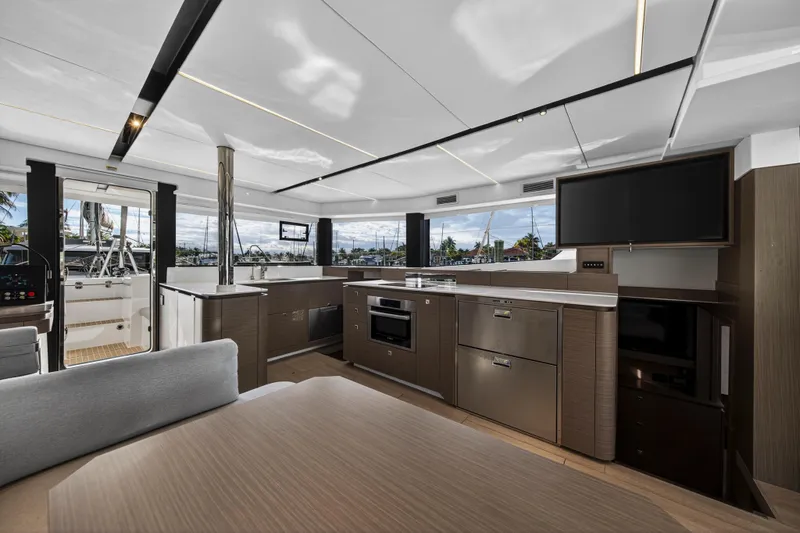 Slide: The Image of Luxurious interior of 2025 Leopard 46 yacht with modern kitchen and sleek design. - 24
