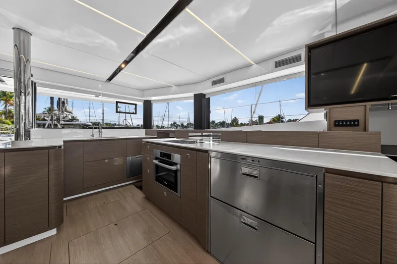 Slide: The Image of Modern kitchen interior on 2025 Leopard 46 yacht, featuring sleek design and advanced appliances. - 26