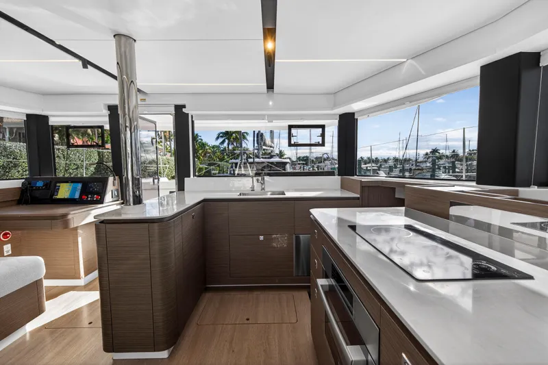 Slide: The Image of Luxurious interior of 2025 Leopard 46 yacht with modern kitchen and panoramic windows. - 27