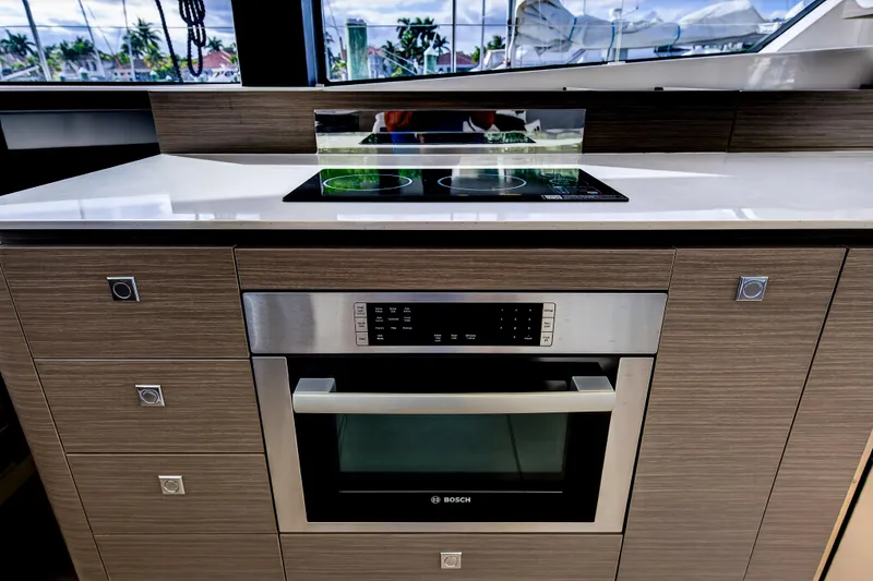 Slide: The Image of Modern kitchen in 2025 Leopard 46 yacht with Bosch oven and sleek cooktop. - 29