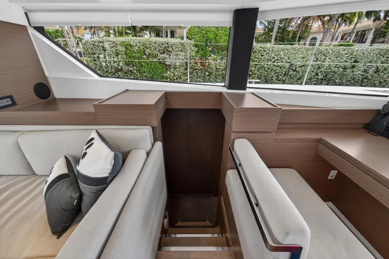 Slide: The Image of Interior of 2025 Leopard 46 yacht with modern seating and large windows. - 39