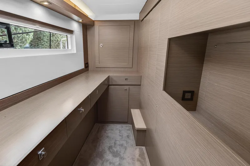 Slide: The Image of Luxurious interior of 2025 Leopard 46 yacht with sleek wood finish and modern design. - 42