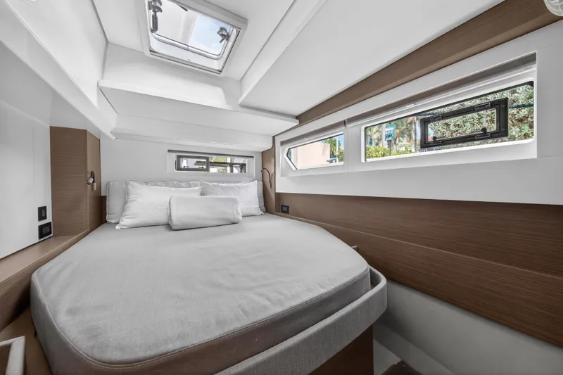 Slide: The Image of Luxurious cabin interior of 2025 Leopard 46 yacht with modern design and ample natural light. - 47