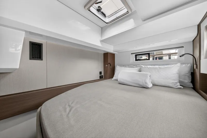 Slide: The Image of Modern bedroom interior in 2025 Leopard 46 yacht, featuring sleek design and comfortable bedding. - 49
