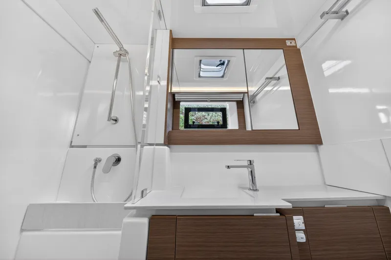 Slide: The Image of Modern bathroom in 2025 Leopard 46 yacht with sleek fixtures and wood accents. - 50
