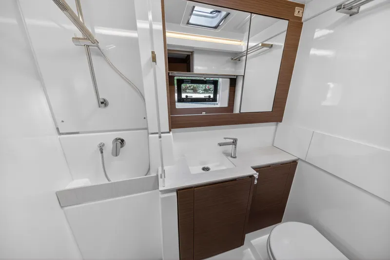 Slide: The Image of Modern bathroom in 2025 Leopard 46 yacht with sleek fixtures and wood accents. - 51