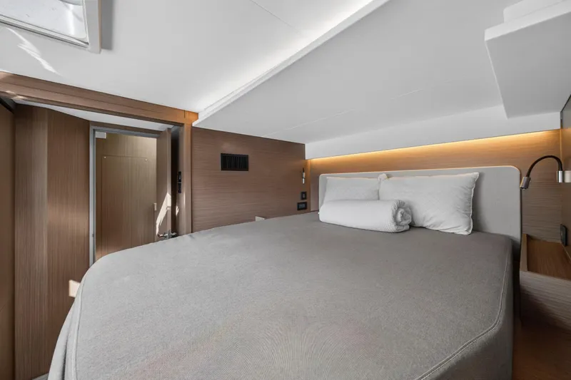 Slide: The Image of Luxurious bedroom interior of 2025 Leopard 46 yacht with modern design and ambient lighting. - 54