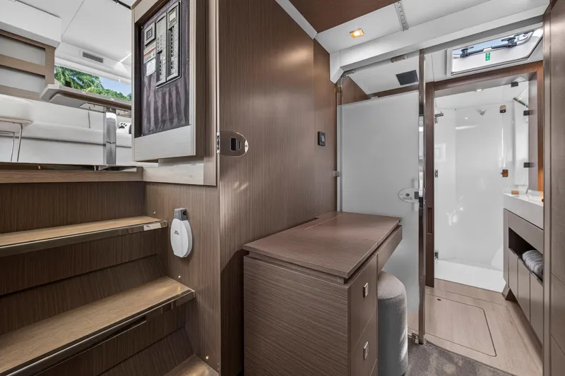 Slide: The Image of Modern interior of 2025 Leopard 46 yacht featuring sleek wood finishes and compact design. - 62