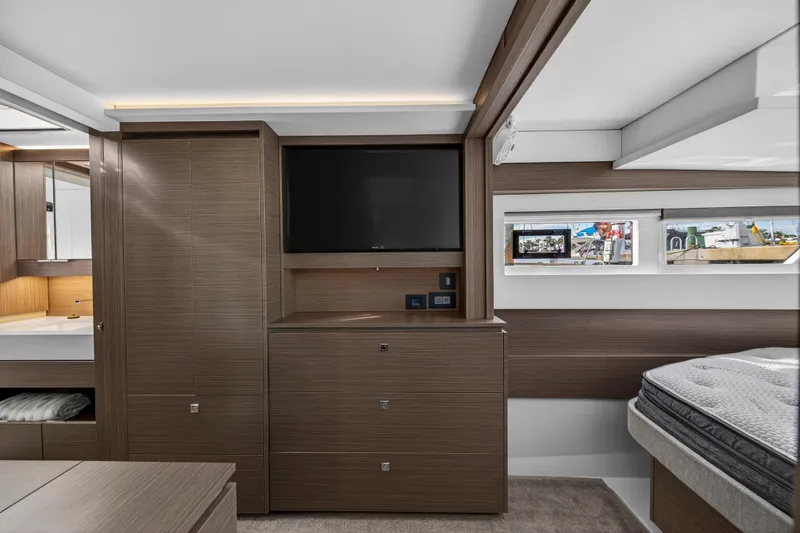 Slide: The Image of Luxurious interior of 2025 Leopard 46 yacht with modern wood finish and sleek design. - 64