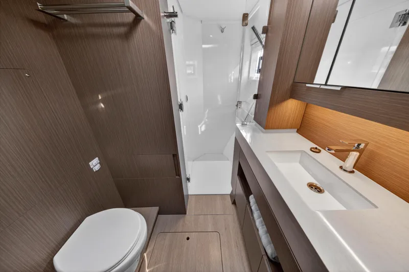 Slide: The Image of Modern bathroom in 2025 Leopard 46 yacht with sleek wood finishes and elegant fixtures. - 66