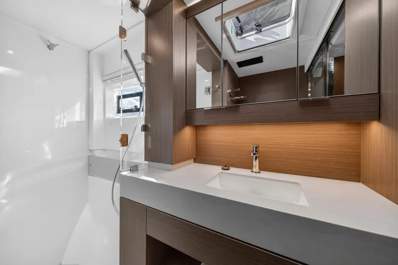 Slide: The Image of Luxurious bathroom interior of 2025 Leopard 46 yacht with modern fixtures and wood accents. - 67