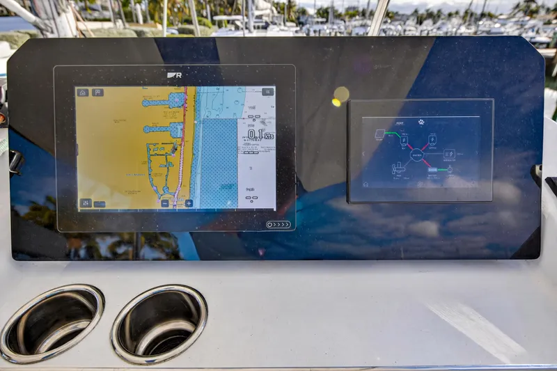 Slide: The Image of Navigation display on 2025 Leopard 46 yacht, showing digital maps and controls. - 74