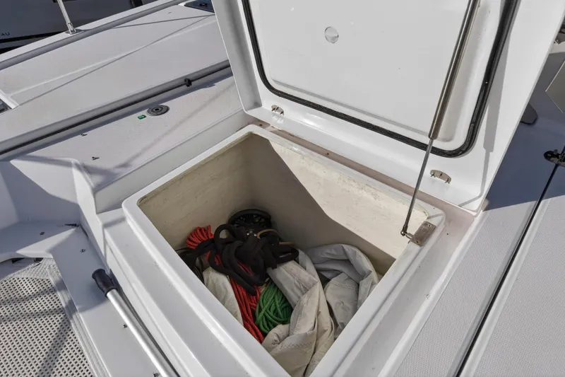 Slide: The Image of Open storage compartment on 2025 Leopard 46 yacht, containing ropes and equipment. - 90