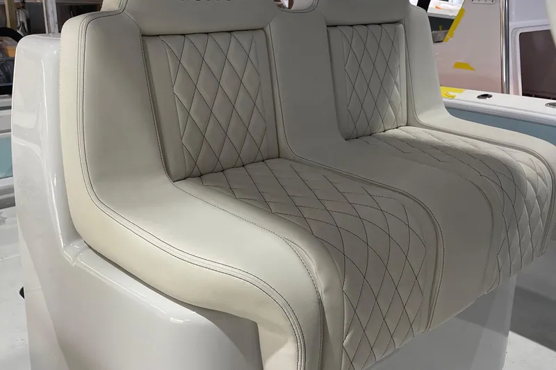Slide: The Image of Luxurious beige seating on 2022 Conch 33 boat with diamond stitching design. - 5