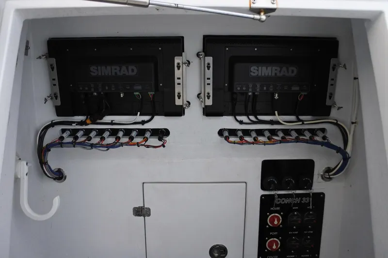 Slide: The Image of Electrical panel of 2022 Conch 33 boat with Simrad equipment and wiring. - 9